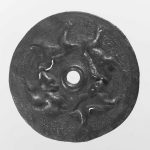 Decorative roundel, possibly a sword suspension button from a belt, with an embossed hunt scene, from Valkenburg. Image: National Museum of Antiquities, Leiden (CC0 1.0) Circular embossed artefact with a central hole, surrounding which there is a hunt scene