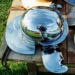 Ferrous Weisenau (Imperial-Gallic)-type helmet. Image: MCB A ferrous helmet with broad neck guard, cheek pieces, and brow guard.
