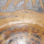 Punctim inscription recording that the shield boss belonged to a member of legio VIII Augusta. Image: © The Trustees of the British Museum (CC BY-NC-SA 4.0) Unit identification inscription punched into a legionary shield boss.