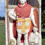 Polychrome reconstruction of the infantry tombstone of Firmus. Image: Nightflyer (CC BY-SA 4.0) Tombstone stele, rectangular with a sphinx flanked by lions on top, a figure in a niche, above an inscription. It is decorated in bright colours.